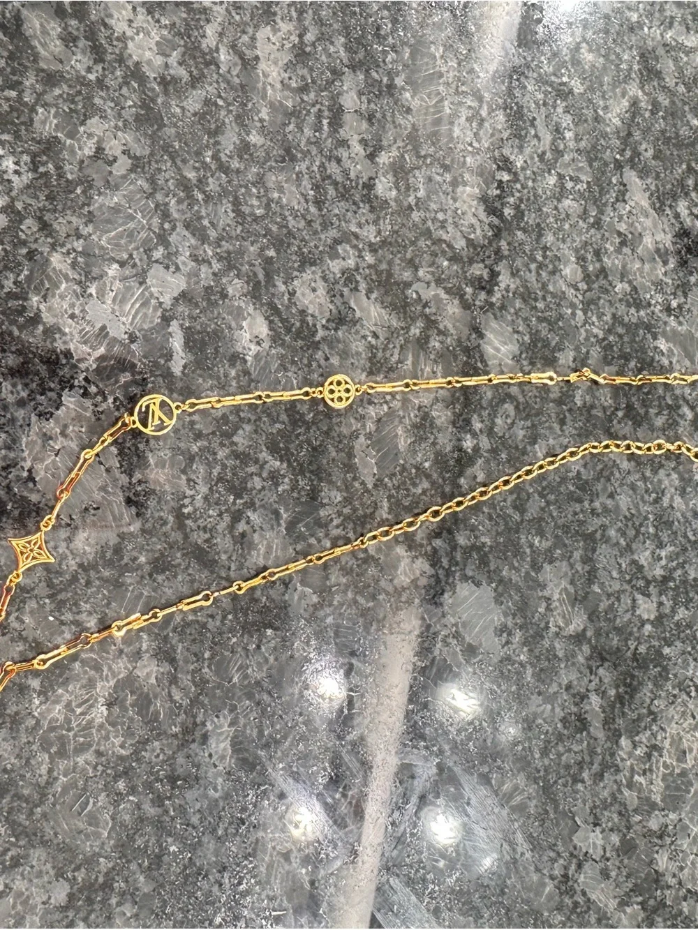 Louis Vuitton gold tone